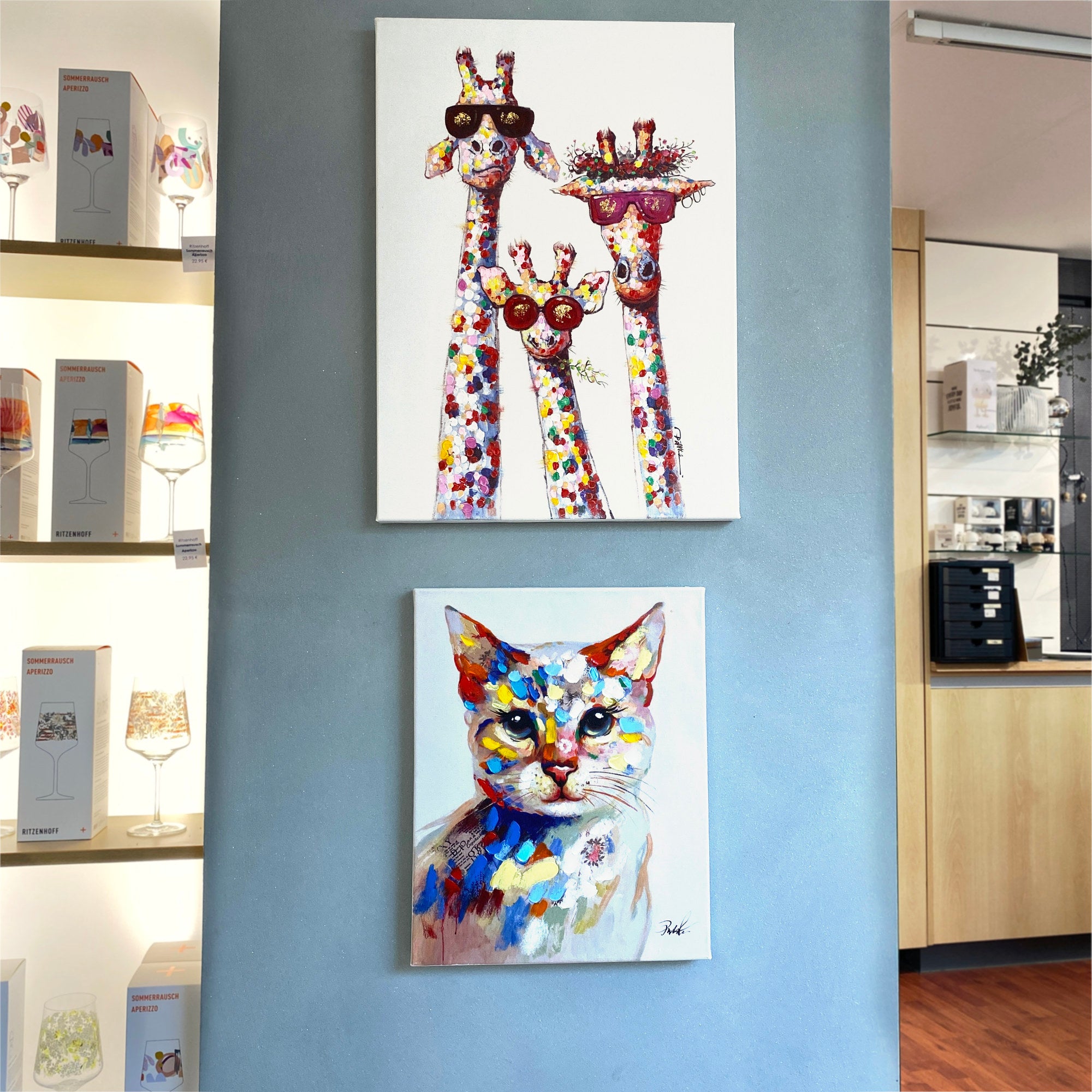 Zwei Kunstwerke von Imageland: Giraffen am Morgen und buntes Kätzchen